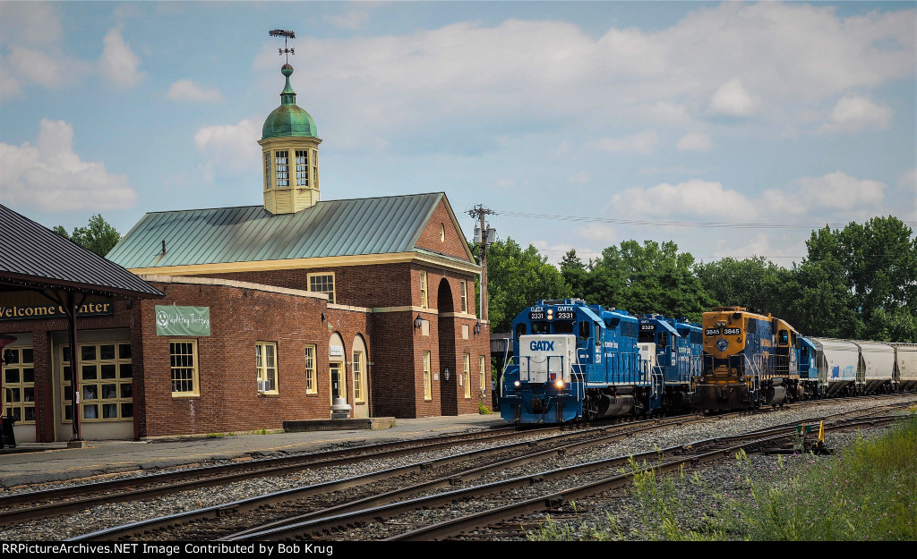 Northbound VTR detour train passes the Amtrak passenger depot in White